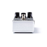 The bottom image of a MXR guitar pedal with a metallic silver finish.