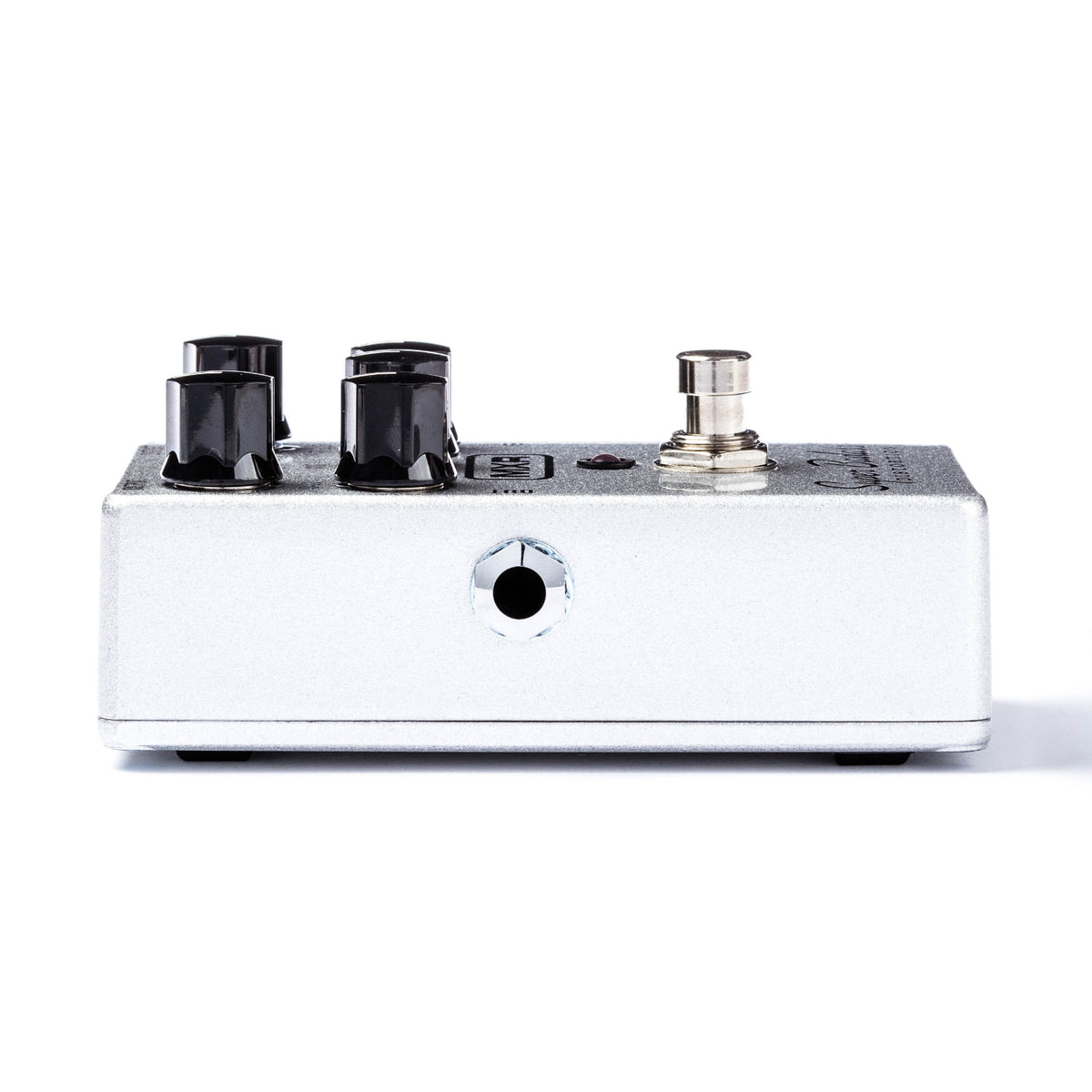 The left view of an MXR pedal with silver metallic finish. Various controls and output jack can be seen.