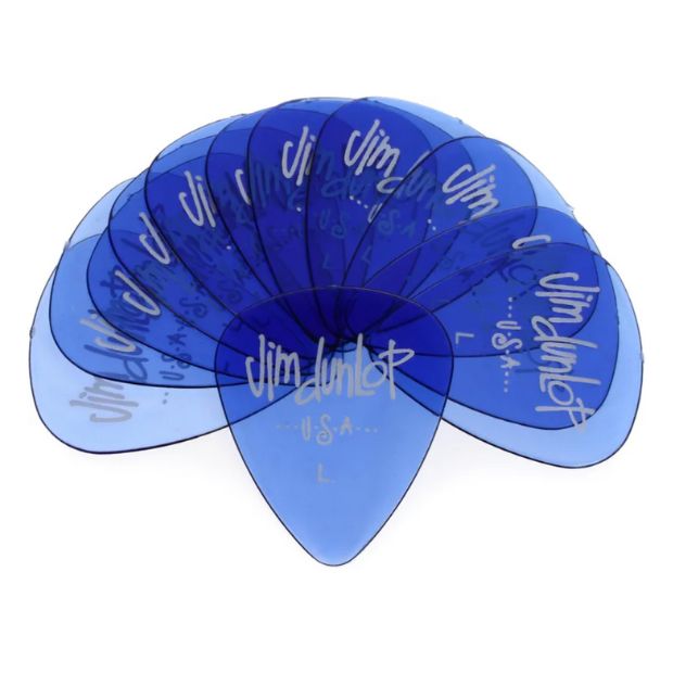 The image shows a fan-like arrangement of translucent blue guitar picks branded with "Jim Dunlop" in white text. The picks appear uniform in thickness and material, likely celluloid or similar plastic. Jim Dunlop is a well-known maker of guitar accessories. These picks are used to strum or pluck guitar strings and come in various thicknesses and colors to suit different playing styles.