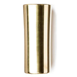 The image shows a brass guitar slide, a polished cylindrical tube used to create smooth, gliding tones by sliding along guitar strings. Commonly worn on the ring finger or pinky, slides come in various materials like glass, ceramic, steel, and brass, each affecting tone. Brass slides produce a warm, mellow sound with good sustain and are essential for blues, country, rock, and other slide guitar styles.
