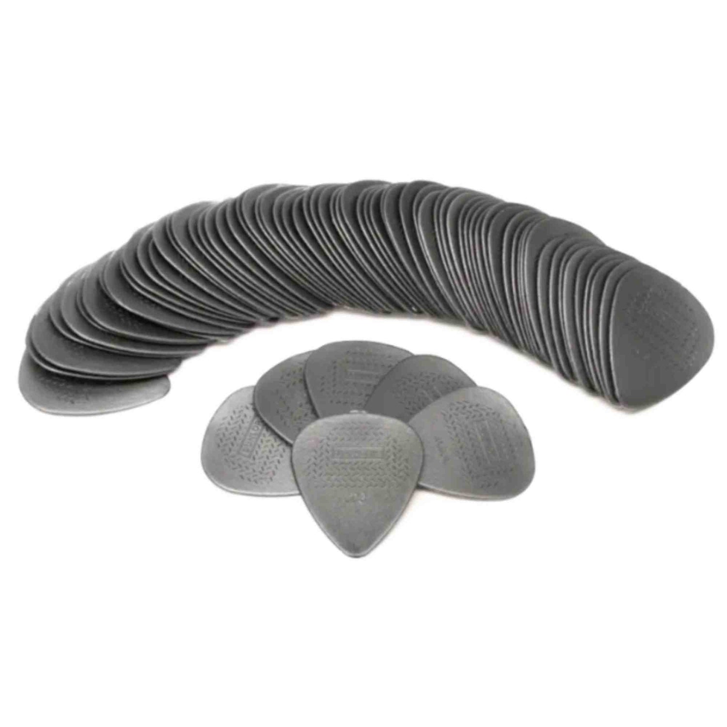 The image shows dozens of black or dark gray teardrop-shaped guitar picks arranged in a curved, fan-like pattern, with a few displayed separately in the foreground. These matte-finished picks likely have a grip texture to prevent slipping and are made of plastic. This bulk collection is practical for musicians who need multiple picks for playing, practice, or performance.