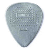 The image shows a gray Dunlop guitar pick with a classic teardrop shape. It features the "DUNLOP" brand and "U.S.A." marking, indicating it is made in the United States. The pick has a textured grip with diagonal ridges to prevent slipping, along with a pointed tip and rounded body. This popular accessory is designed to give guitarists better control when strumming or plucking strings.