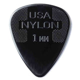 The image shows a black nylon guitar pick with "USA NYLON" and "1 MM" embossed on it. It features a classic teardrop shape with a pointed tip, a textured dotted grip on the upper portion, and white text and borders. The 1mm thickness offers a balance of flexibility and durability, suitable for both strumming and lead playing.
