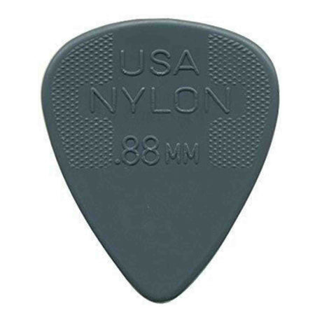 The image shows a dark gray nylon guitar pick with a classic teardrop shape. It features "USA NYLON" and "88MM" embossed on it, indicating a thickness of 0.88mm. The pick has textured crosshatch grip areas on both upper sides and a smooth playing tip. This medium-thickness pick offers durability, balanced tone, and improved grip for better control while playing.