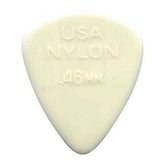 The image shows a cream-colored, teardrop-shaped guitar pick with embossed text reading "USA NYLON" and ".46 MM," indicating its thin gauge. The textured surface provides grip, and its light thickness suggests a softer attack and brighter tone when playing.