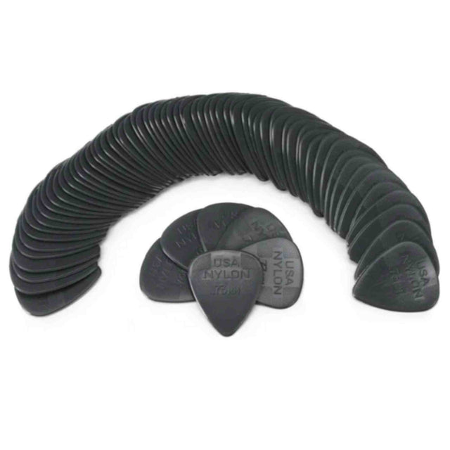 The image shows a curved fan-like arrangement of dark nylon guitar picks, some marked with "NYLON." These picks, essential for guitarists, are used to pluck or strum strings and come in various shapes and thicknesses. Nylon picks are valued for durability, grip, and warm tone. This appears to be a bulk set, typical for musicians needing multiple picks to replace lost or worn ones.