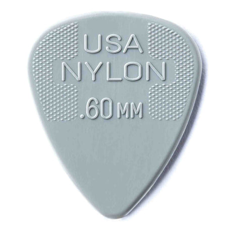The image shows a light grayish-green nylon guitar pick with ".60MM" thickness embossed, indicating a 0.60 mm medium gauge. It features a textured crosshatch grip on both sides near the top to prevent slipping. Made in the USA, this pick balances flexibility and control, making it suitable for various playing styles. Nylon material offers durability and a balanced tone.