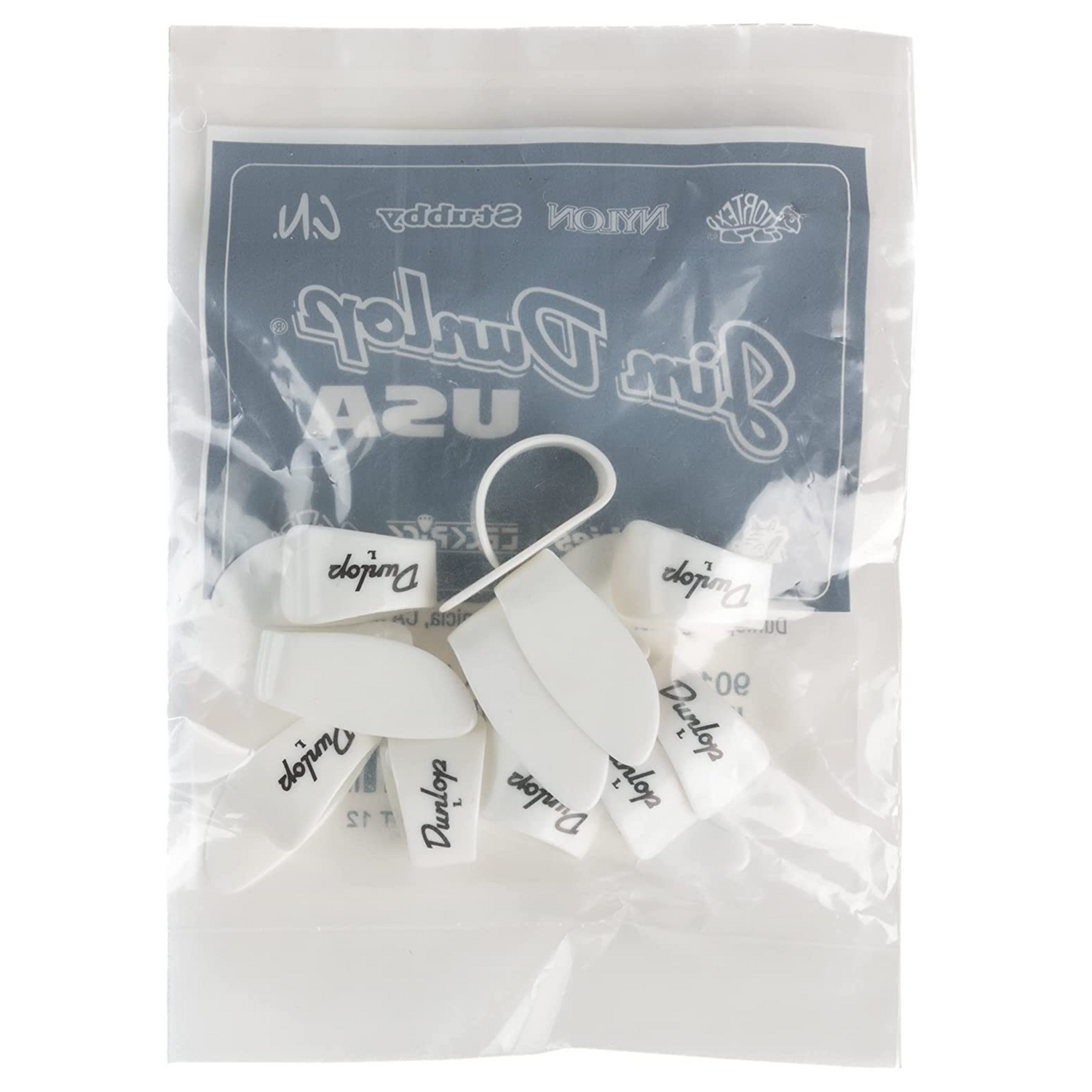 The image shows a package of Dunlop guitar picks featuring multiple white picks with "Dunlop" printed in black. The packaging has a dark blue-gray header with the Dunlop logo and branding, including text that appears to read "Gim Purple USA." The picks are displayed in a small plastic pouch, a common way they are sold. Dunlop is a well-known maker of guitar accessories.