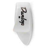 The image shows a white, teardrop-shaped guitar pick with "Dunlop" printed in black. Made of smooth plastic, it features the classic design used by many guitarists. Dunlop is a well-known brand that produces picks in various materials and thicknesses for different playing styles. Guitar picks like this are essential accessories for plucking or strumming strings to create sound.