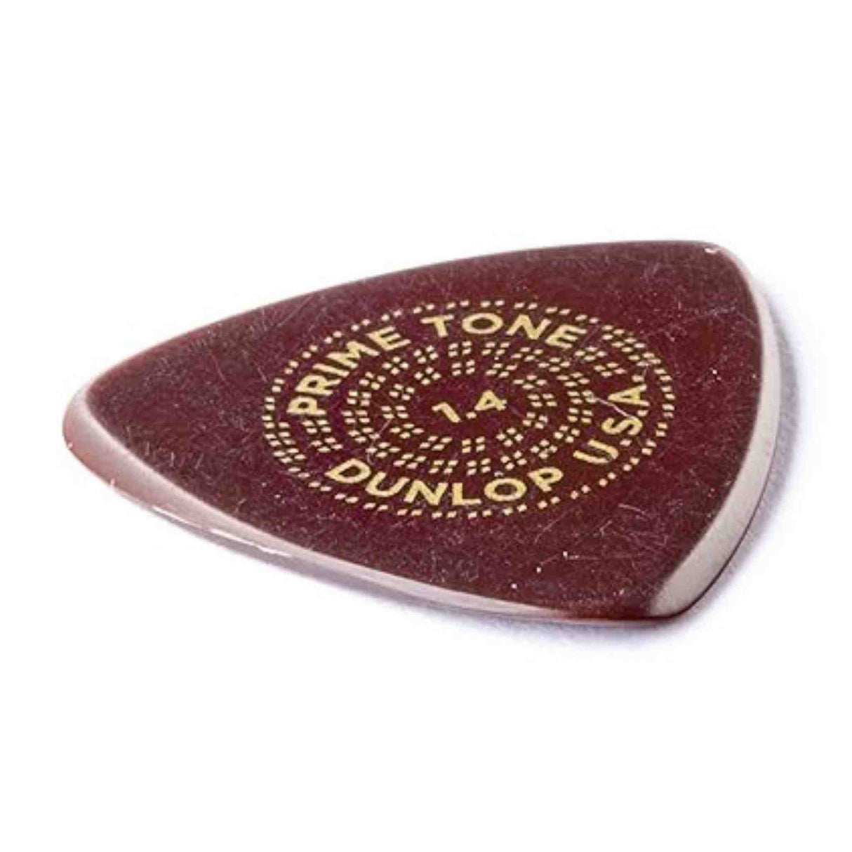 The image shows a Dunlop Primetone guitar pick with a teardrop shape and a deep reddish-brown color. It features a textured grip surface and text arranged circularly: "PRIMETONE" at the top, "1.4" in the center indicating thickness in millimeters, and "DUNLOP USA" at the bottom. This 1.4mm thick pick is part of Dunlop's premium series, favored for its durability and tone, suitable for heavy strumming and precise playing.