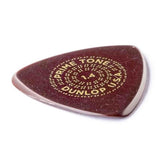 The image shows a Dunlop Primetone guitar pick with a teardrop shape and a deep reddish-brown color. It features a textured grip surface and text arranged circularly: "PRIMETONE" at the top, "1.4" in the center indicating thickness in millimeters, and "DUNLOP USA" at the bottom. This 1.4mm thick pick is part of Dunlop's premium series, favored for its durability and tone, suitable for heavy strumming and precise playing.