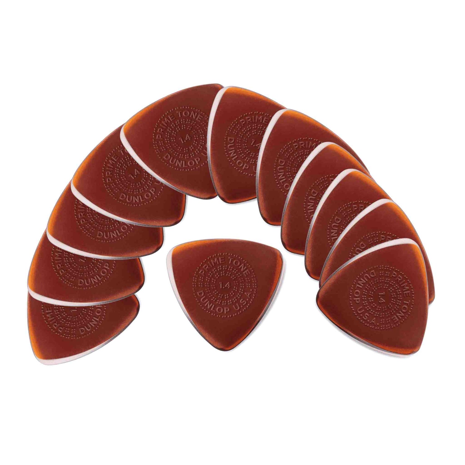 The image shows a circular arrangement of 12-13 translucent amber Dunlop guitar picks with a tortoiseshell appearance. Each teardrop-shaped pick features the "DUNLOP" logo printed on its surface. These picks are popular among guitarists for their warm color and playing feel. Dunlop is a recognized brand known for producing picks in various materials and thicknesses to suit different styles.