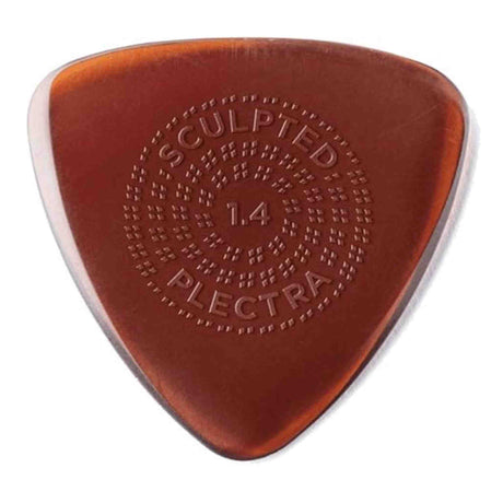 The image shows a triangular guitar pick with a warm amber tortoiseshell color. It has embossed text: "SCULPTED" at the top, "1.4" in the center (thickness in mm), and "PLECTRA" at the bottom. The pick features a circular textured pattern of raised dots for improved grip. This 1.4mm medium-heavy gauge pick offers precision, control, and slight flexibility, designed for serious musicians seeking enhanced performance.