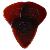 The image shows three Dunlop Primetone guitar picks with a teardrop shape and translucent amber finish. Each pick features embossed circular text reading "PRIME TONE" and "DUNLOP USA," along with a visible thickness of .88mm. Known for their premium construction and sculpted tips, these picks offer durability, good grip, and smooth string release, favored by guitarists for both acoustic and electric playing.