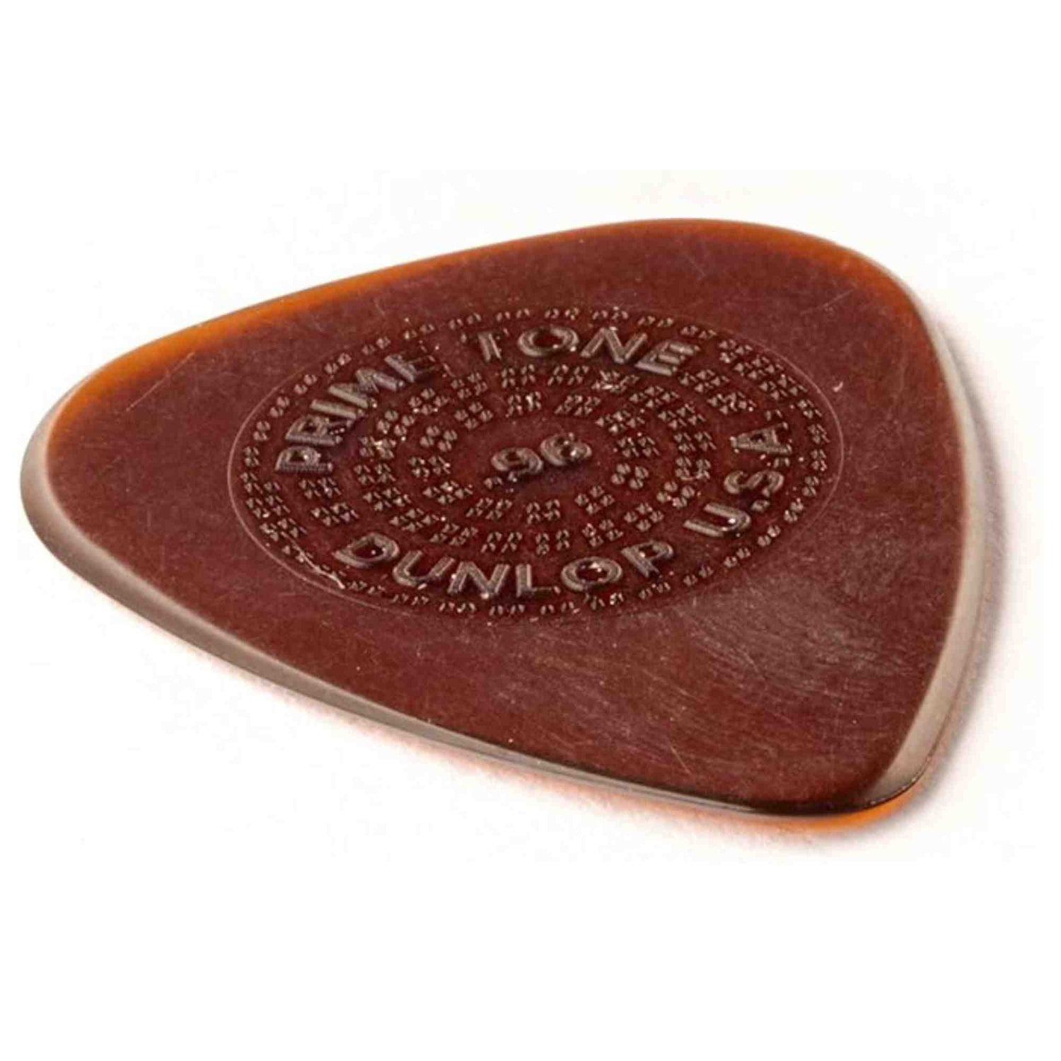 The image shows a Dunlop Primetone guitar pick with a classic teardrop shape in brown/amber celluloid or similar plastic. The embossed Dunlop logo and "PRIMETONE" text surround the gauge information in a circular pattern. This premium pick is known for hand-finished edges, excellent grip, and vintage tone, commonly used to strum or pluck acoustic, electric, or bass guitar strings.