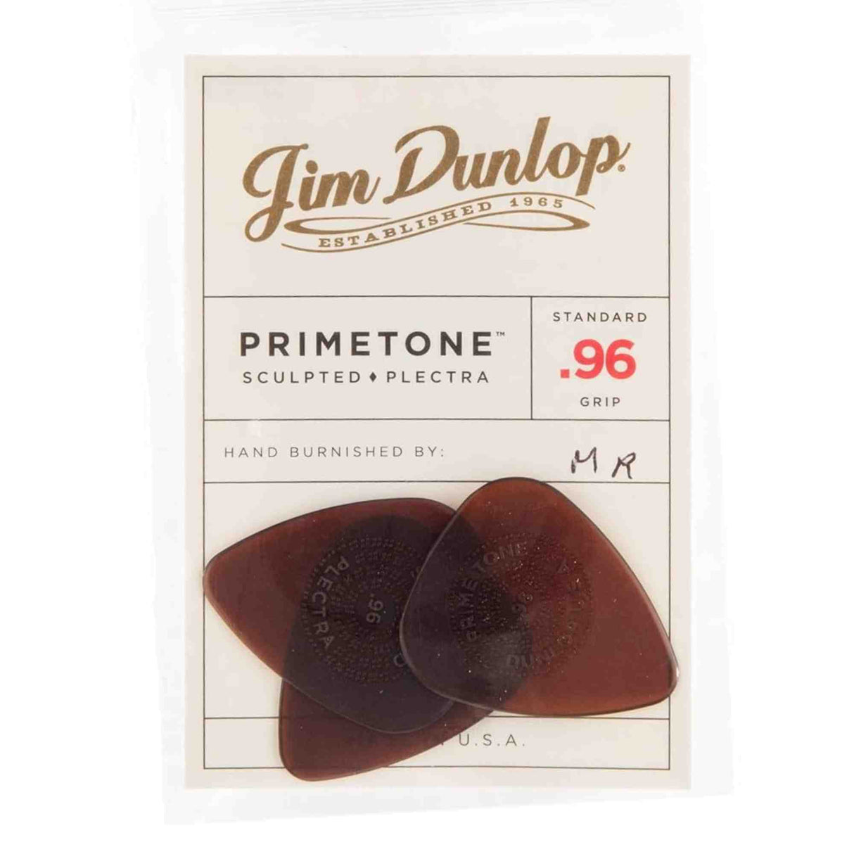 The image shows a package of three Jim Dunlop Primetone guitar picks, made from Sculpted Plectra material with a standard .96 mm thickness (red color). They have a hand-burnished finish marked "MR," feature the Dunlop logo, and are made in the U.S.A. Established in 1965, Jim Dunlop’s Primetone line offers premium picks known for quality tone, grip, and craftsmanship.