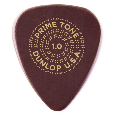 The image shows a teardrop-shaped, tortoiseshell-colored guitar pick with gold text and a dotted circular design. It reads "PRIME TONE" at the top, "DUNLOP U.S.A." at the bottom, and "1.0" in the center, indicating a 1.0mm thickness. This Dunlop Primetone pick is a medium-heavy gauge popular for its smooth surface and versatile use in strumming and lead playing.