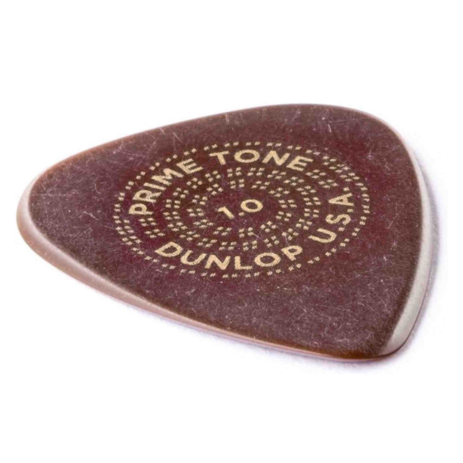 The image shows a dark reddish-brown Dunlop Primetone guitar pick with a teardrop shape and the "1.0" marking indicating 1.0mm thickness. It features Dunlop’s circular logo and textured surface for grip. The pick shows some wear from use. Dunlop Primetone picks are premium, known for durability and smooth play, popular among guitarists for their balance of flexibility and control.