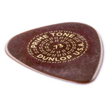 The image shows a Dunlop Primetone guitar pick with a teardrop shape and text reading "PRIMETONE," "DUNLOP USA," and ".73" in a circular pattern. The pick has a dark brown, tortoiseshell-like color with gold lettering. Known for sculpted edges and quality materials, this .73mm medium-gauge pick offers a balanced tone and grip for strumming and picking.