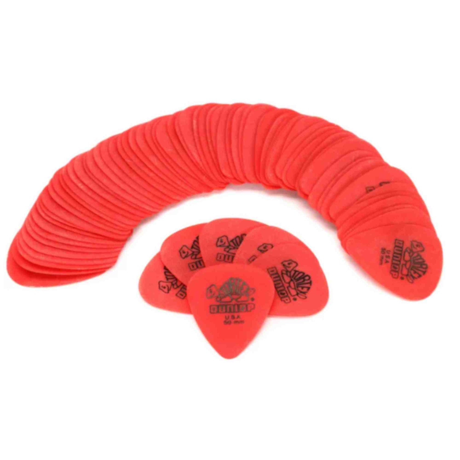 The image shows a collection of red Dunlop guitar picks arranged in a curved, fan-like pattern on a white background. The picks are standard teardrop shape, likely medium gauge. Dunlop branding is visible on several picks. These bulk picks are common for guitarists, as picks are frequently lost or worn out during play.