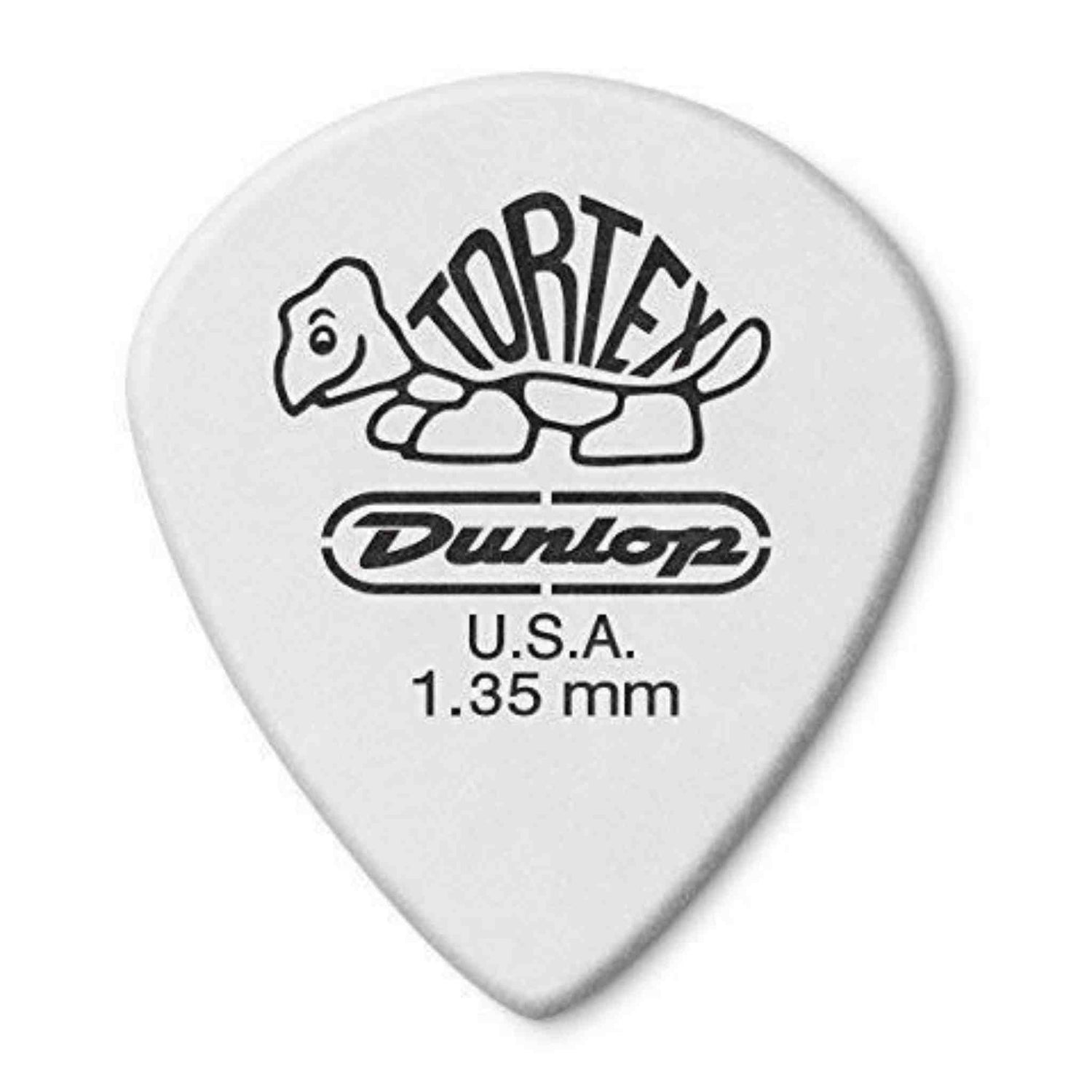 The image shows a Dunlop Tortex guitar pick with a classic teardrop shape in white/light gray. It features the iconic turtle logo with "TORTEX" text, "Dunlop" branding below, a "U.S.A." mark, and a thickness label of 1.35 mm. This heavy gauge pick is known for its durability, textured grip, and synthetic material that mimics traditional tortoise shell tones.
