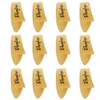 The image shows 12 Dunlop guitar picks arranged in a 3x4 grid. Each pick features the Dunlop logo and an "M," indicating medium thickness. They have a classic teardrop shape with pointed tips and are made of translucent amber-colored material, likely celluloid. These picks are popular guitar accessories used for strumming and picking, known for quality and precision.