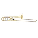 The image shows a tenor trombone, a brass wind instrument with a golden finish. Key features include the flared bell, U-shaped slide mechanism for pitch changes, mouthpiece receiver, and curved tubing. Unlike other brass instruments, it uses a slide instead of valves, enabling smooth glissando effects. It is commonly used in orchestras, jazz bands, and marching bands.