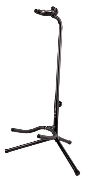 The image shows a black TETON guitar stand with a tripod base and adjustable vertical pole. It has padded curved yokes to cradle the guitar’s body and a lower support arm for the guitar’s bottom. Designed for acoustic or electric guitars, the stand offers stable, secure storage and protection from scratches, making it ideal for home, studio, or stage use.