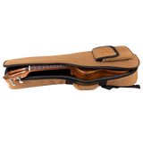 A ukulele inside of a tan gig bag with Eddy Finn branding