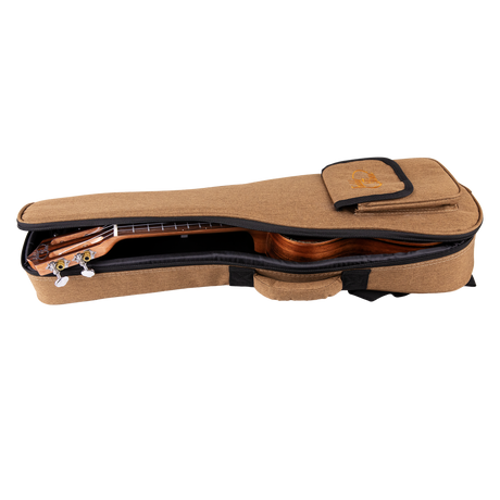 A ukulele inside a tan gig bag with Eddy Finn branding on a white background