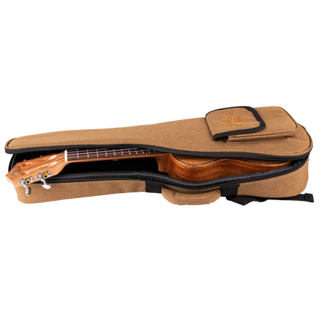 A ukulele inside of a tan gig bag with Eddy Finn branding on a white background