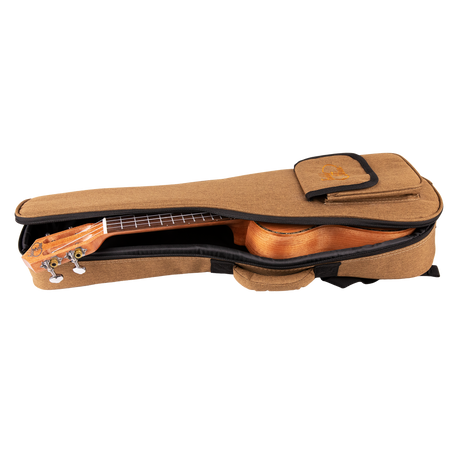 A ukulele inside a tan colored gig bag with Eddy Finn branding on a white background