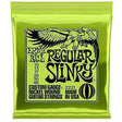 The image shows a package of Ernie Ball Regular Slinky electric guitar strings, model 2221, with bright green packaging and the eagle logo. It contains nickel-wound strings in the 10-46 gauge set (10, 13, 17, 26, 36, 46). This popular set offers a balanced tone and playability, favored by guitarists across genres. Ernie Ball is a trusted brand known for quality guitar strings.