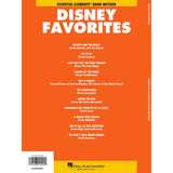 Disney Favorites music book for alto sax with orange cover and white text listing songs from various Disney movies.