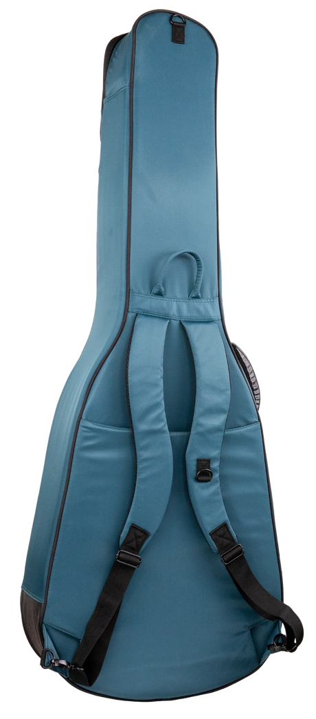 The image shows a teal padded soft-shell guitar gig bag with backpack straps and a top handle. It features a full-length zipper, an external front pocket for accessories, and reinforced edges for durability. Designed for full-size acoustic or electric guitars, it offers lightweight, portable protection ideal for everyday transport.
