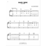 The image shows a sheet music page for "Baby Mine" from Disney's Dumbo, with words by Ned Washington and music by Frank Churchill. It features a piano/vocal arrangement in 3/4 time, key of F major, marked "Moderately slow." The page includes treble and bass clefs, chord symbols (C/E, Dm, Gm7, etc.), lyrics under the melody, dynamic marking "mf," and spans three systems.