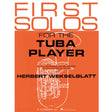 Book cover of 'First Solos for the Tuba Player' by Herbert Wekselblatt with an orange background and tuba illustration.