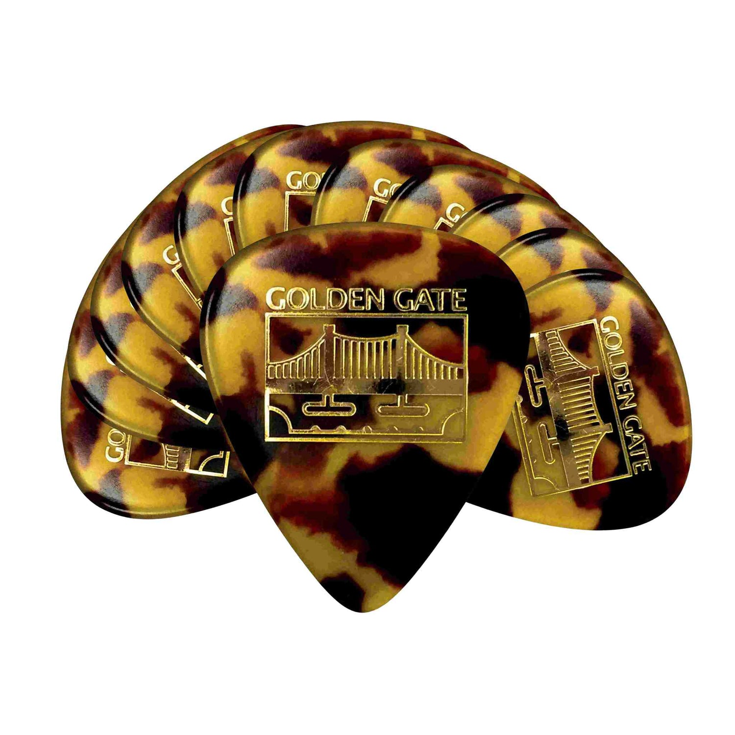 The image shows a fan-like arrangement of tortoiseshell-patterned guitar picks from the brand "Golden Gate." Each pick features the Golden Gate logo with text and an illustration of the bridge. Made from celluloid or similar material, these picks have a classic amber and brown marbled design, commonly used by guitarists for strumming or picking, combining vintage style with functional playability.