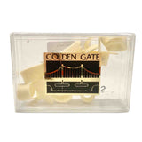 The image shows a clear plastic case labeled "GOLDEN GATE" with a logo of the Golden Gate Bridge, containing several light-colored cane reeds. These flat, thin, slightly curved single reeds are used for woodwind instruments like saxophones or clarinets. The transparent case protects the reeds from damage and moisture while allowing musicians to view them.