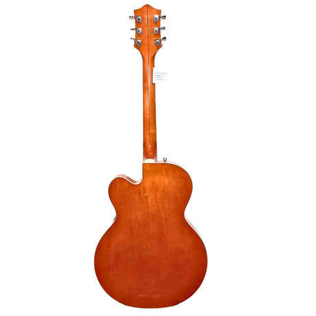 Back view of a orange Gretsch hollow body electric guitar on a white background