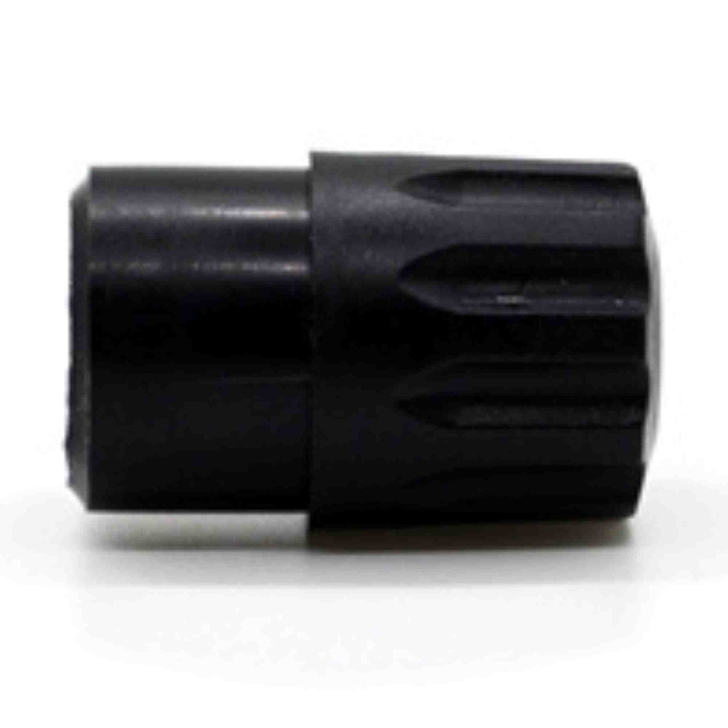 The image shows a black clarinet or saxophone mouthpiece made of hard rubber or ebonite. It features a chamber opening, flat table for attaching a reed, and a bore connecting to the instrument. This essential woodwind component allows the musician’s embouchure to interface with the instrument, enabling the reed to vibrate and produce sound.