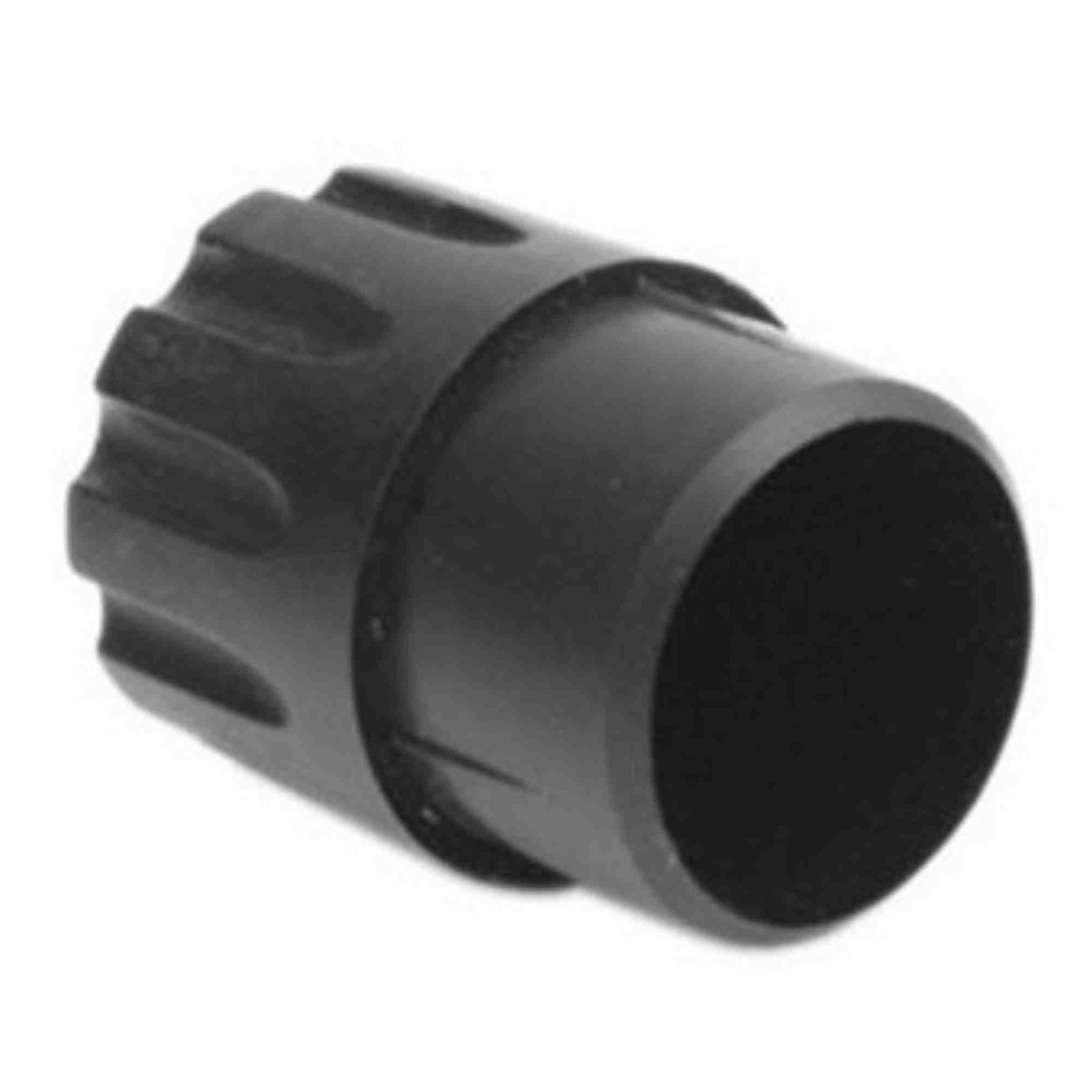 The image shows a black, cylindrical barrel-shaped component made of plastic or hard rubber. It resembles a clarinet barrel or joint connector, typically used between the mouthpiece and upper joint of a clarinet. The smooth exterior and hollow interior bore are visible, essential for airflow and tuning. This piece helps adjust pitch and tone, making it an important woodwind instrument accessory.