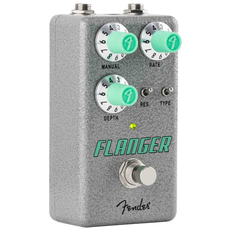Fender flanger guitar effects pedal with green knobs and switch on a white background