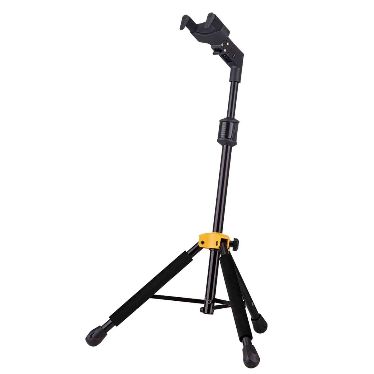 The image shows a black tripod-style guitar stand with an adjustable height pole and three-legged base for stability. It features a yellow/orange locking clamp, padded yoke to protect the guitar’s body, and adjustable arms to fit various guitar sizes. Designed for professional use, it securely holds guitars during performances or practice while preventing scratches and damage.