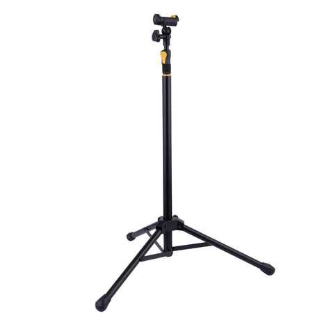 Black tripod stand with adjustable head on a white background