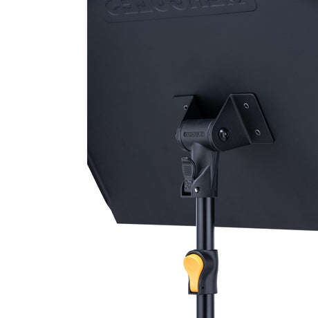Back of a Hercules music stand showing the desk and quick adjuster