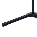 Foot of a black music stand on a white background