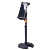 Phone holder with a black stand and gold accents on a white background