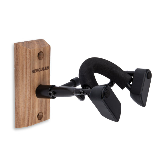 A black violin hanger with a wood base on a white background
