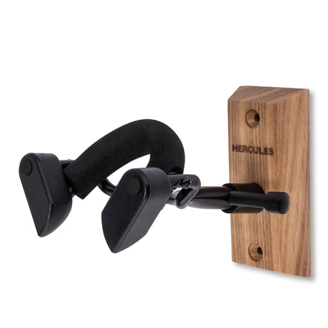 A black violin hanger with a wood base on a white background